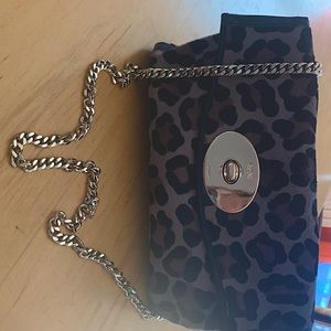 Barely used Coach handbag.  Fabulous gold chain.  Great price!